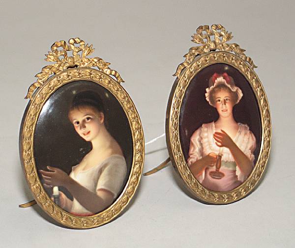 Appraisal: Two Continental porcelain gilt bronze mounted miniature oval plaques Good