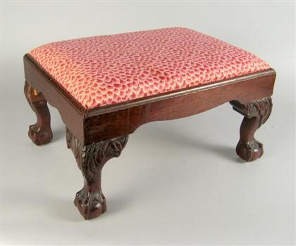 Appraisal: English mahogany foot stool The rectangular padded top above a