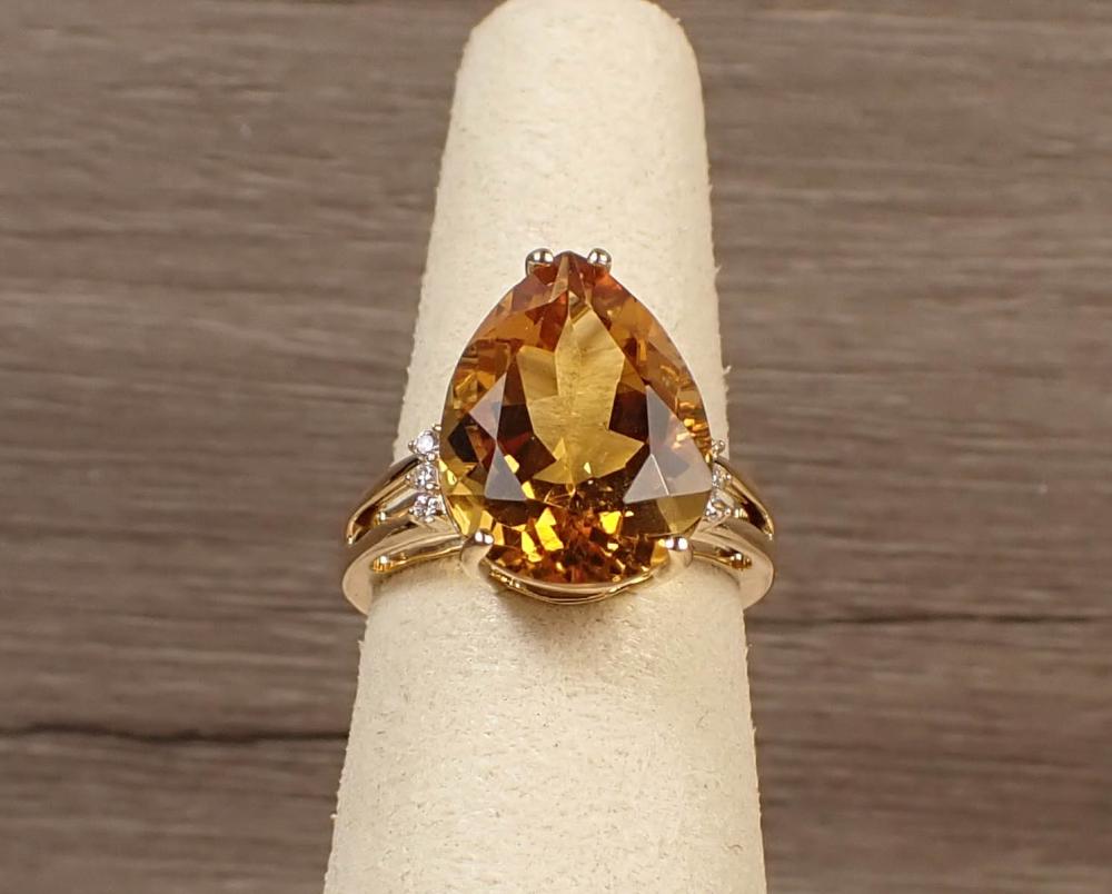 Appraisal: CITRINE DIAMOND AND FOURTEEN KARAT GOLD RING The k yellow