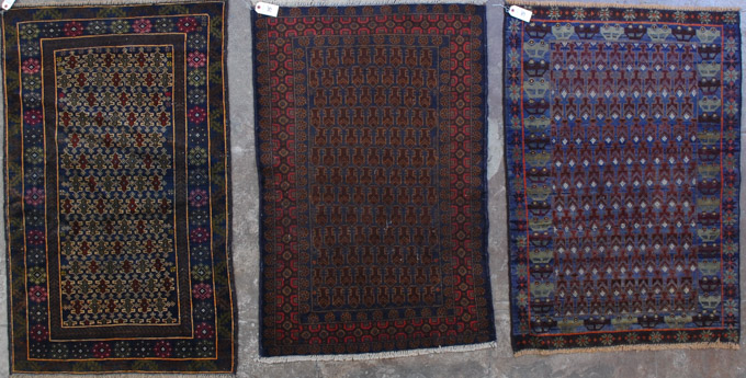 Appraisal: THREE AFGHAN BELOUCHI TRIBAL AREA RUGS all hand knotted sizes