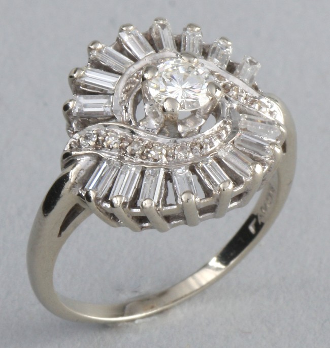 Appraisal: KW ring Featuring round diamonds approximately ctw Ring also features