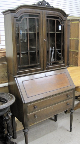 Appraisal: LOUIS XVI REVIVAL WALNUT SECRETARY BOOKCASE American c 's having