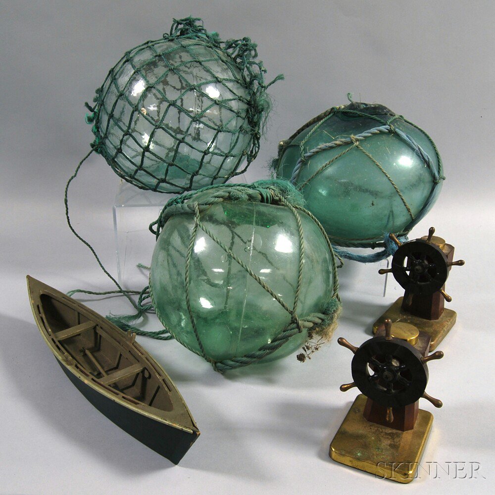 Appraisal: Six Nautical-themed Items three aqua glass floats a green-painted wooden