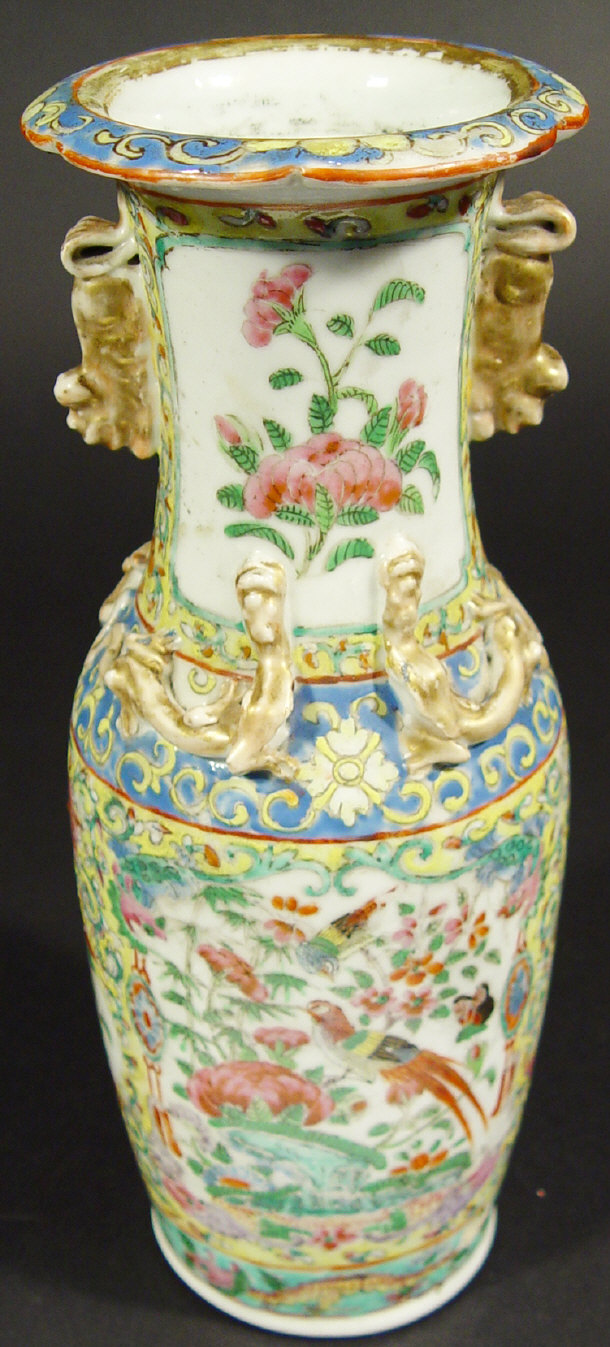 Appraisal: Cantonese porcelain vase surmounted with dog of foo and dragons