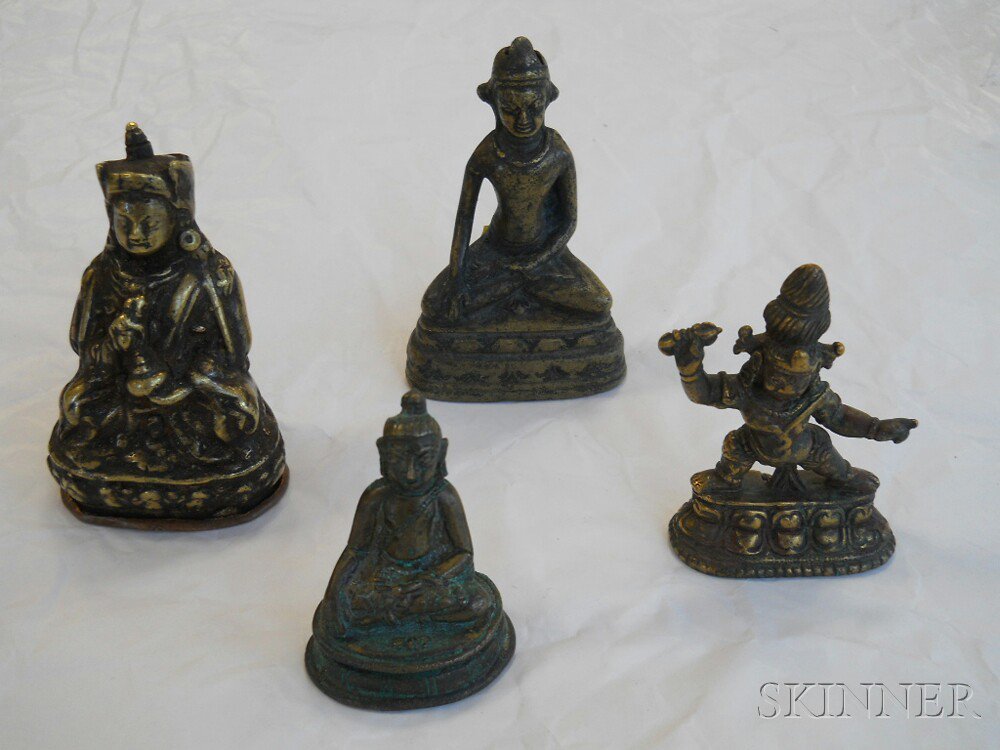 Appraisal: Four Bronze Figures Tibet a Buddha seated on a pedestal