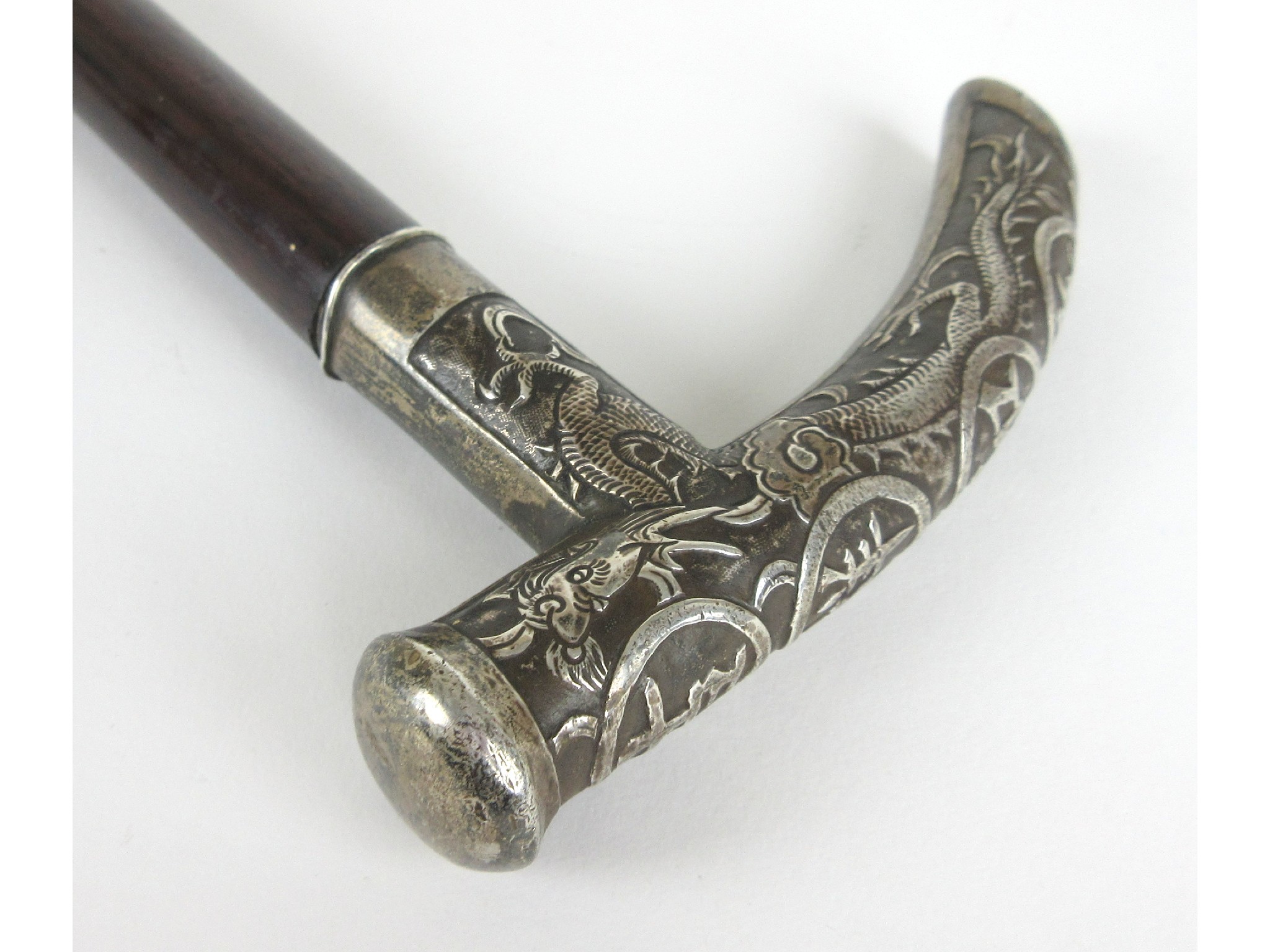 Appraisal: A Chinese silver mounted Tau shaped ebony walking stickthe handle