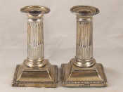 Appraisal: A pair of late Victorian sterling silver candlesticks the Corinthian