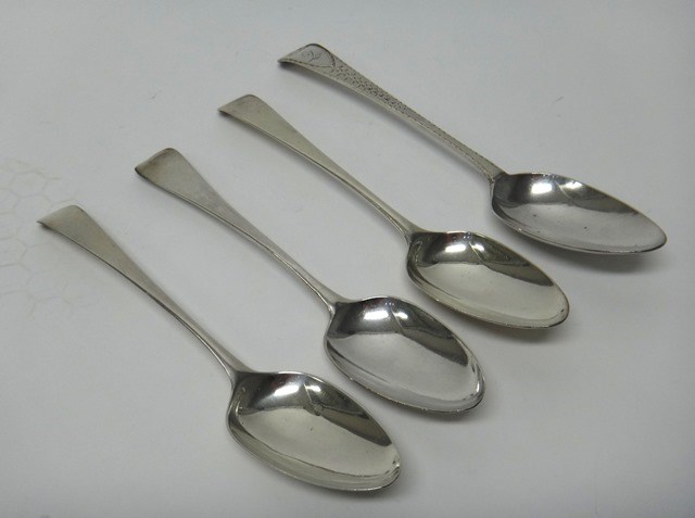 Appraisal: A pair of silver Hanoverian pattern bottom marked tablespoons London