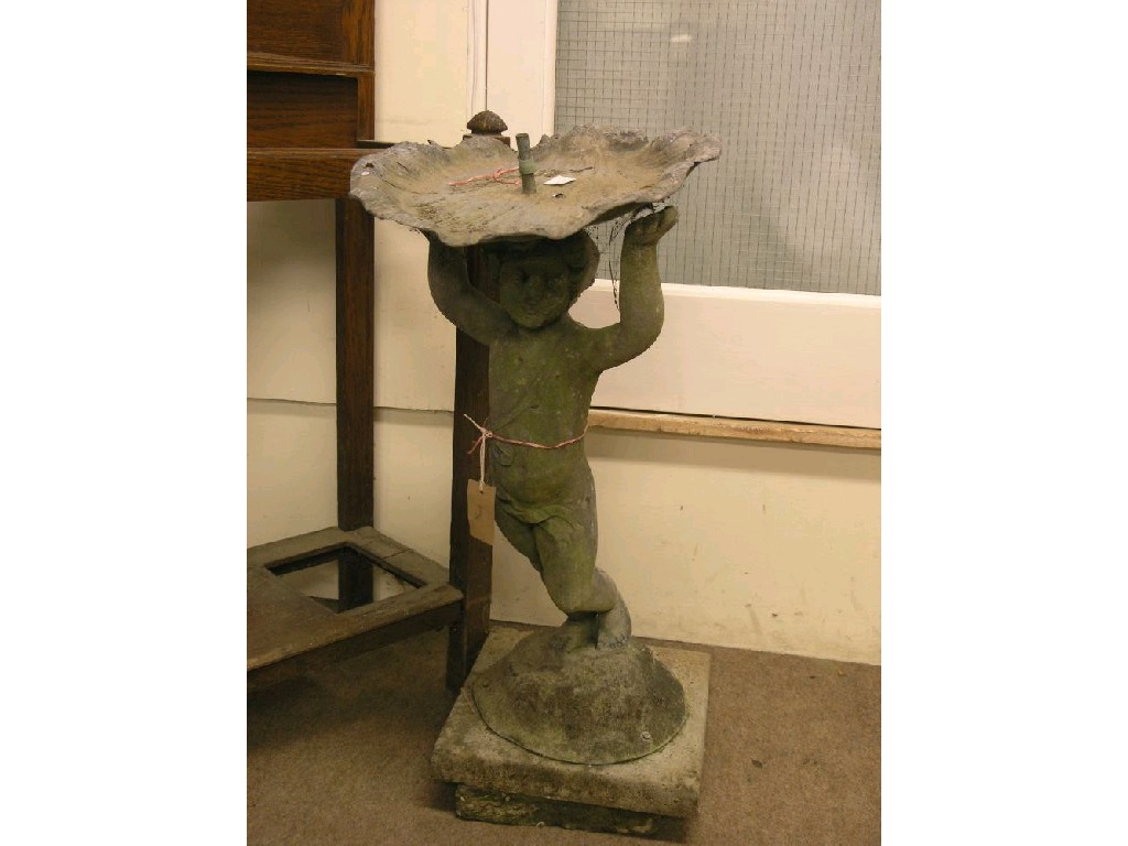 Appraisal: A th century lead garden fountain shell-shaped reservoir supported by