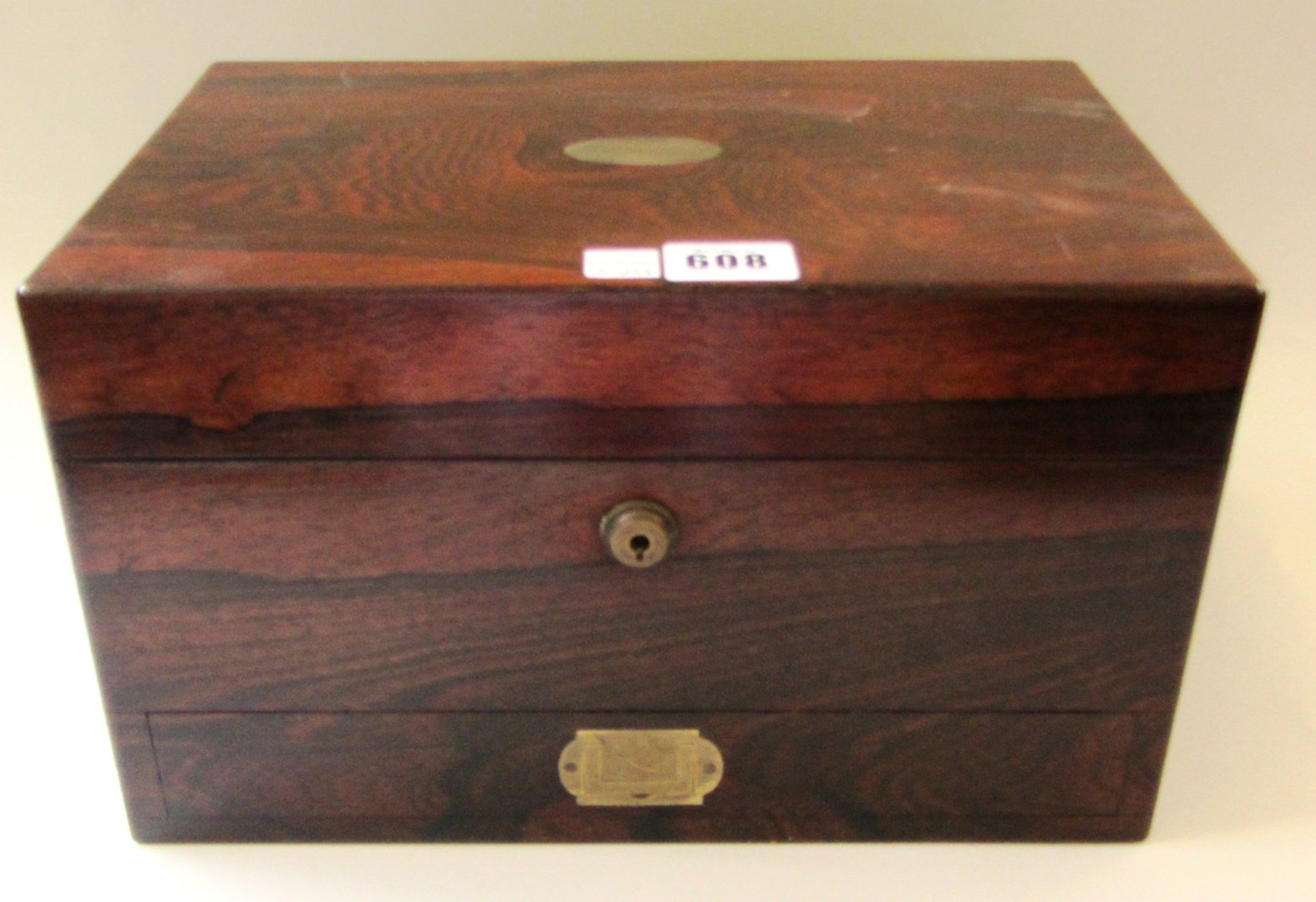 Appraisal: A Victorian brass inlaid rosewood toilet box with fitted interior