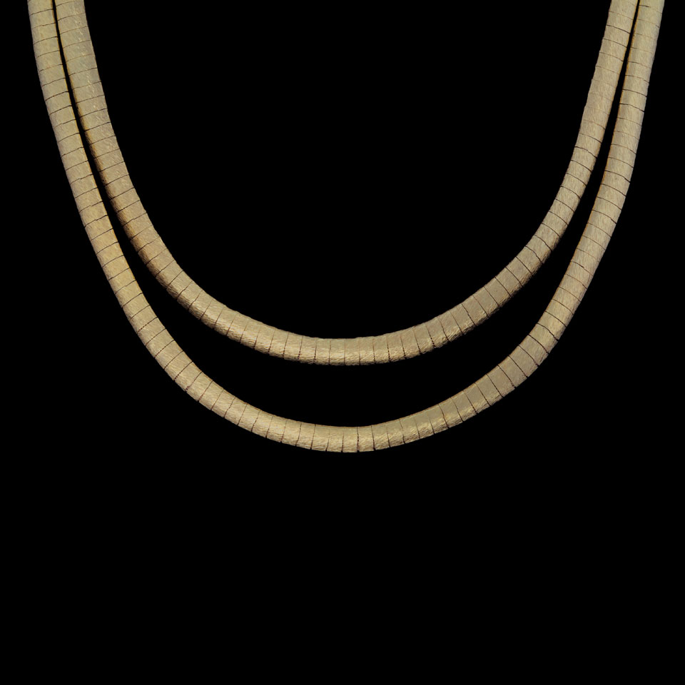 Appraisal: k Yellow Gold Double Strand Necklace together with a matching