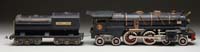 Appraisal: LIONEL STANDARD GAUGE E LOCOMOTIVE AND TENDER White and red