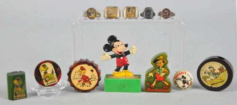 Appraisal: Lot of Walt Disney Rings Pencil Sharpeners Tin and bakelite