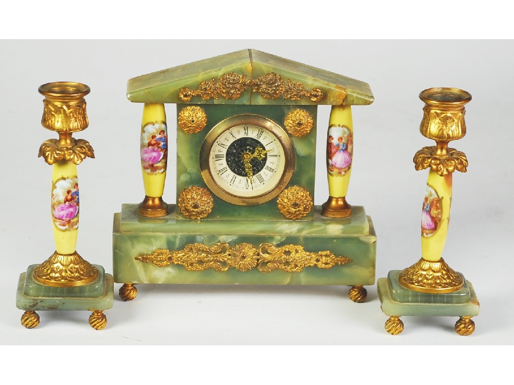 Appraisal: ONYX PORCELAIN AND GILT METAL MOUNTED THREE PIECE CLOCK GARNITURE