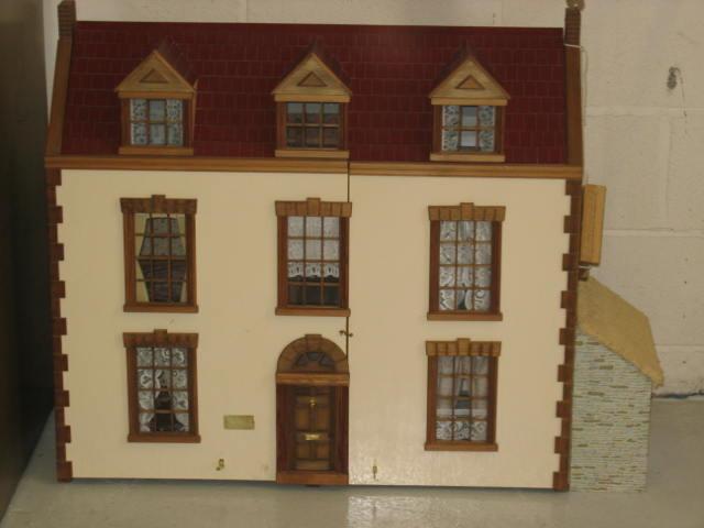 Appraisal: A late th century dolls house in pine and painted