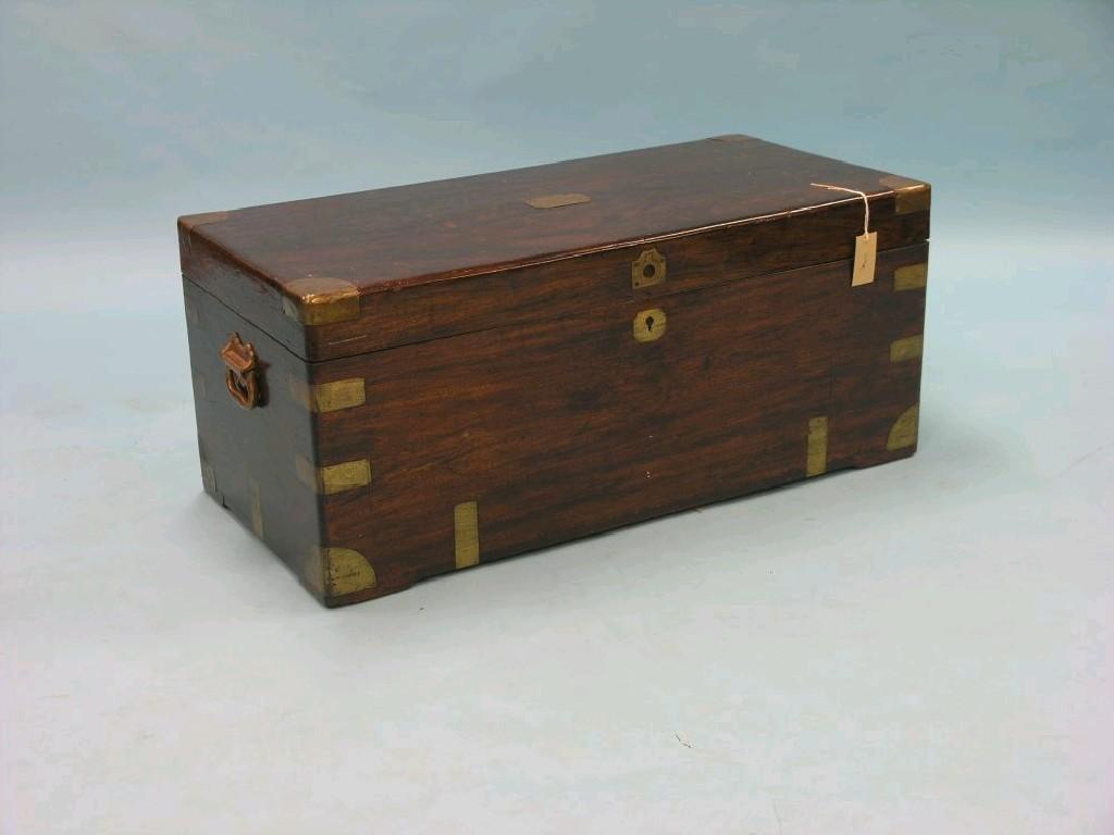 Appraisal: A Victorian mahogany and camphorwood trunk brass-mounted throughout with carrying