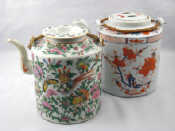 Appraisal: Two large Chinese ceramic teapots with bound handles one in