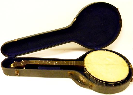 Appraisal: Banjo Vernon four string minor veneer loss missing strings with