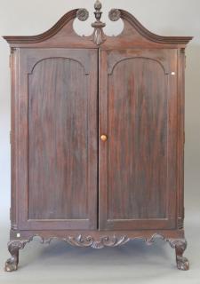 Appraisal: Chippendale style mahogany cabinet with two doors opening to reveal