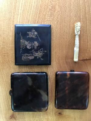 Appraisal: A Japanese mixed metal cigarette case depicting various gods signed