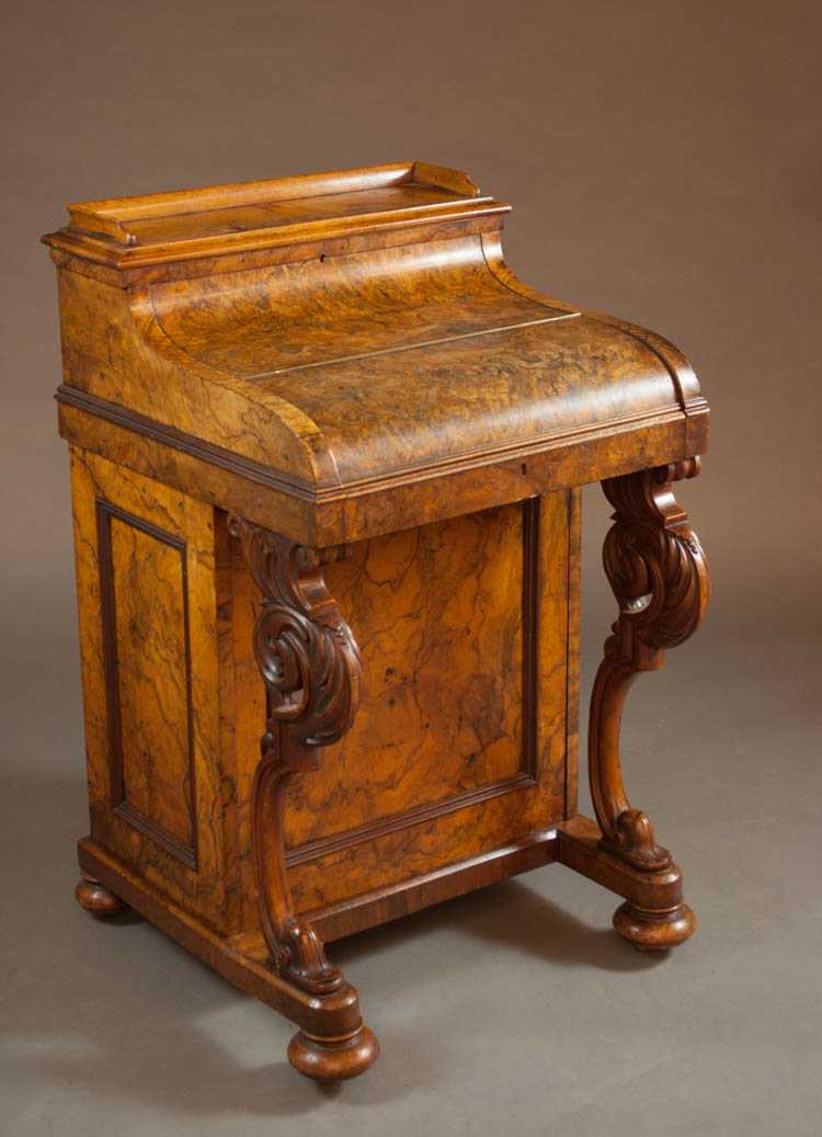 Appraisal: VICTORIAN BURL WALNUT DAVENPORT DESK English th century the serpentine