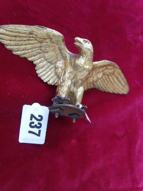 Appraisal: A small th century gilded bronze figure of an eagle