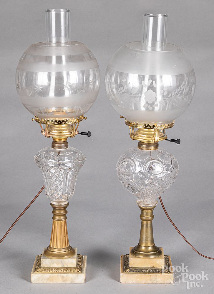 Appraisal: Two glass fluid lamps with etched shades Two glass fluid