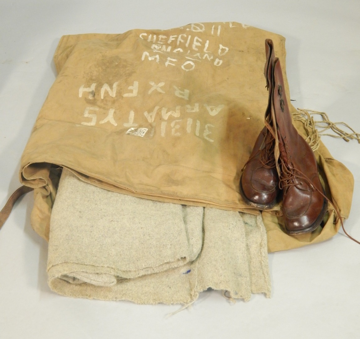 Appraisal: A WWII British Army Officer's valise bedroll with leather strap