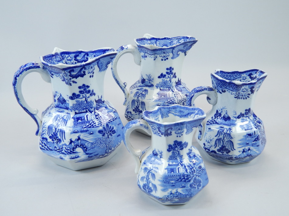 Appraisal: An associated group of four Masons ironstone jugs each printed