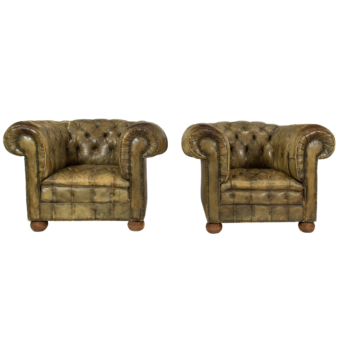 Appraisal: Chesterfield Armchairs pair upholstered in olive leather with outscrolled arms