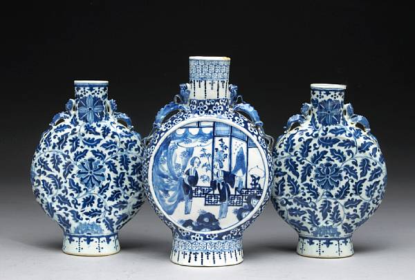 Appraisal: Three blue and white porcelain moon flasks Each similarly formed