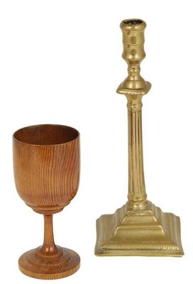 Appraisal: A late George III brass candlestick with a reeded stem