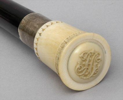 Appraisal: IVORY-HANDLED BAMBOO WALKING STICK The twist-off handle with applied monogram