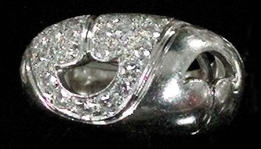 Appraisal: Lady's Platinum and Diamond Openwork Ring the polished wide band