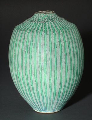 Appraisal: A Peter Beard stoneware vase decorated with vertical turquoise and