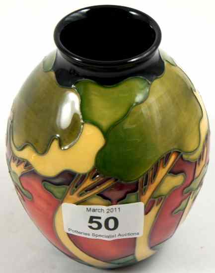 Appraisal: Moorcroft Vase Decorated with Trees on Red Background