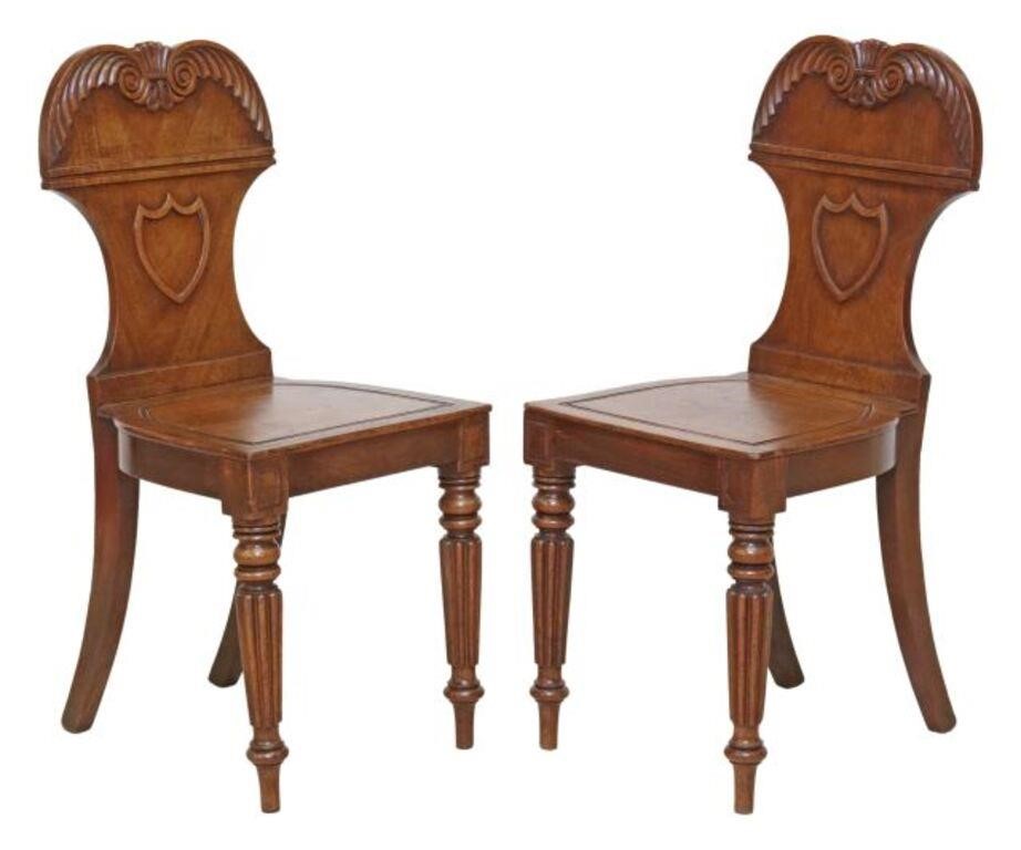 Appraisal: pair English Victorian carved mahogany hall chairs late th c