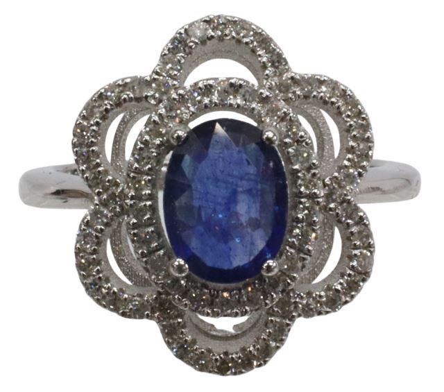 Appraisal: Estate kt white gold floriform ring oval-cut blue sapphire approx