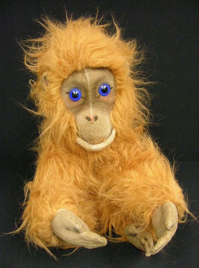 Appraisal: STEIFF ORANGUTAN Estate item This little orangutan is missing his