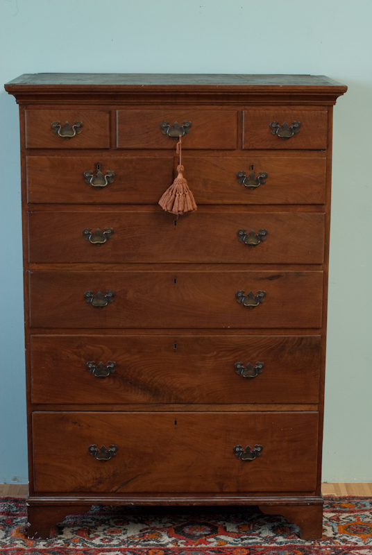 Appraisal: An th C Cherry Tall Chest of Drawers with unknown