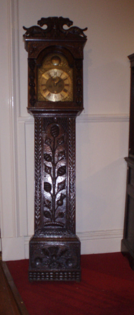 Appraisal: A th century elaborate carved oak longcase clock John Davie