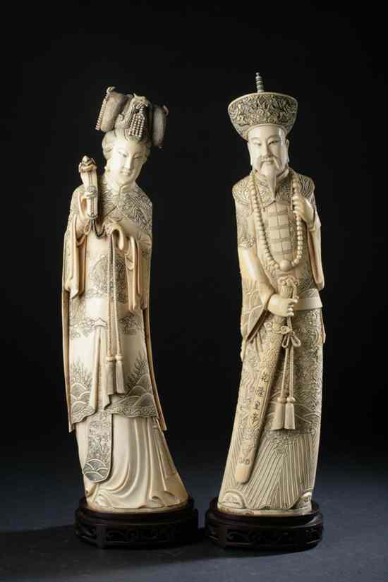 Appraisal: PAIR CHINESE IVORY FIGURES OF EMPEROR AND EMPRESS Qianlong four