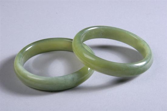 Appraisal: PAIR CHINESE CELADON JADE BRACELETS - in diam