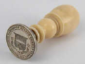 Appraisal: An ivory and silver seal hallmarked London engraved with THE