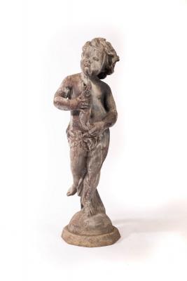 Appraisal: A lead figure of a boy with a fish cm