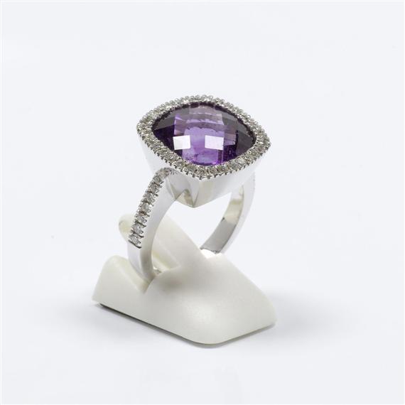 Appraisal: AMETHYST AND DIAMOND RING White gold Casual-elegant solid ring the