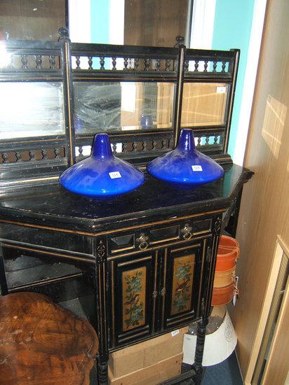 Appraisal: A Victorian ebonised aesthetic shaped side board with raised mirror