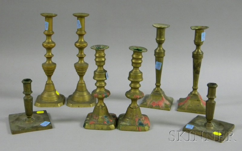 Appraisal: Four Pairs of Brass Candlesticks