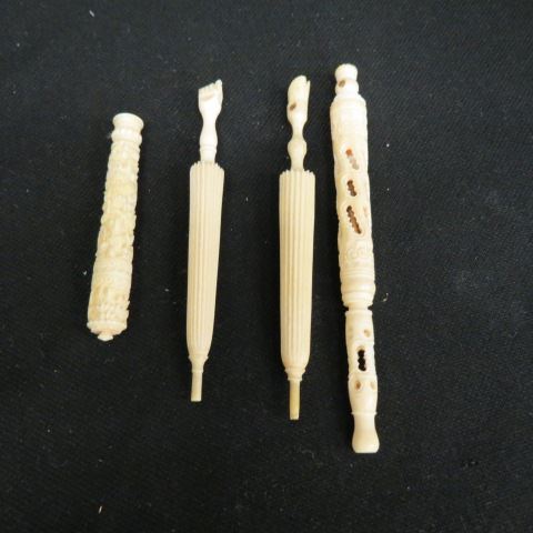 Appraisal: pcs Carved Ivory needle cases and a dip pen two