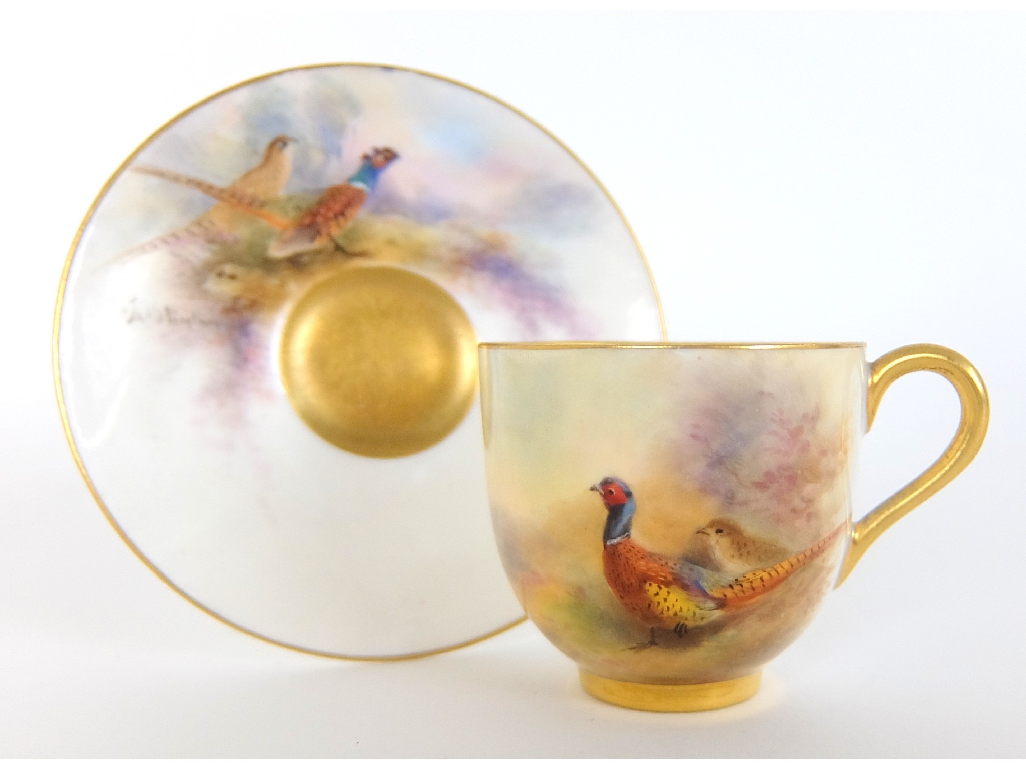 Appraisal: A Royal Worcester painted porcelain cup and saucerpainted by James